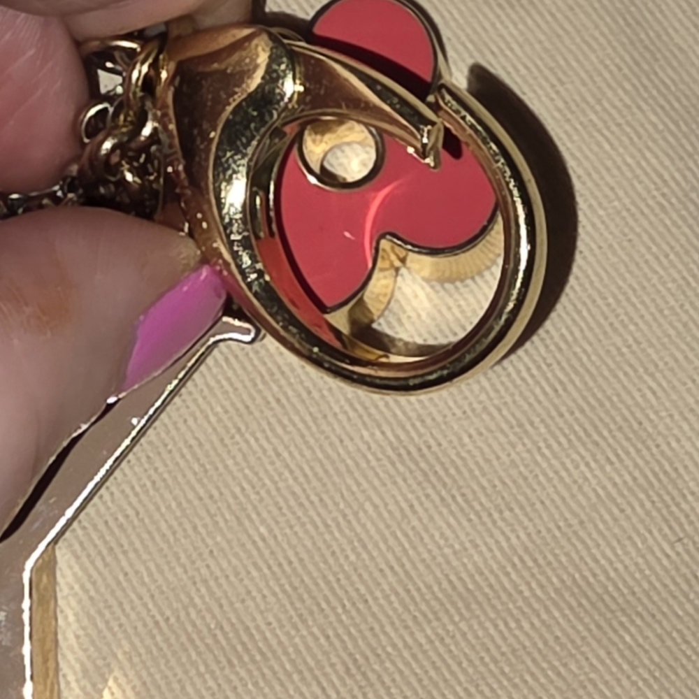 Authentic Louis Vuitton Floral Pink and Gold Key Holder a solid pink color - Picture 8 of 16